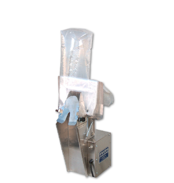 Mini vertical airbagger for bread loaves.