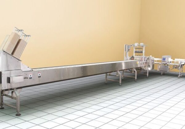 Speedseal LX custom food tray packaging system in a commercial kitchen.